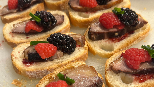 Sweet & Smoky Duck Crostini with Cherry and Fresh Berries